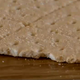 A “survival biscuit” found in food rations from a 1962 time capsule at the University of Montana (screenshot from KPAX)